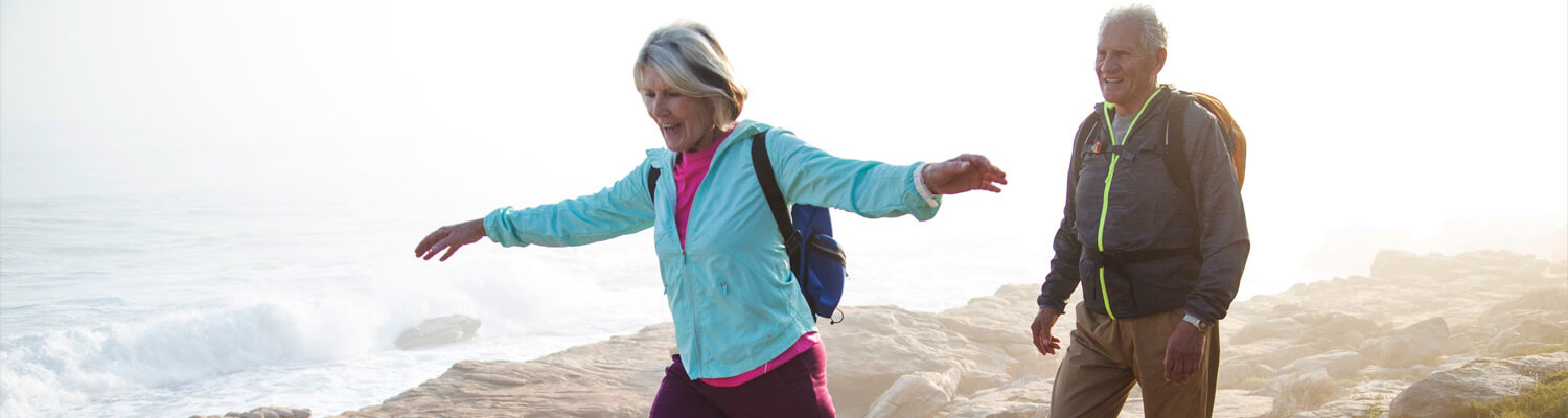 Couple hiking at the beach